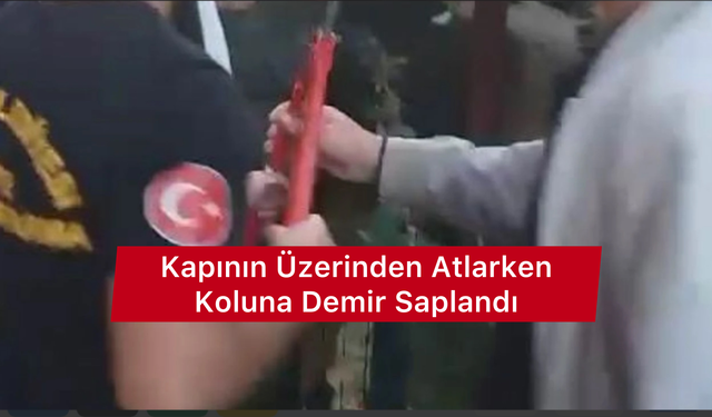 Kapının üzerinden atlamak isteyen çocuğun koluna demir saplandı